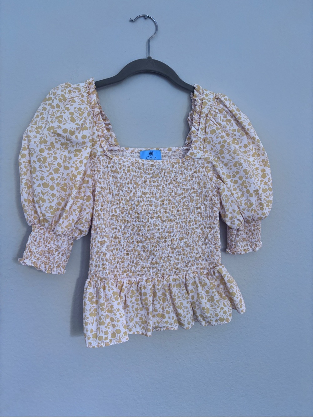 CeCe Cream and Yellow Floral Smocked Peplum Puff-Sleeve Top